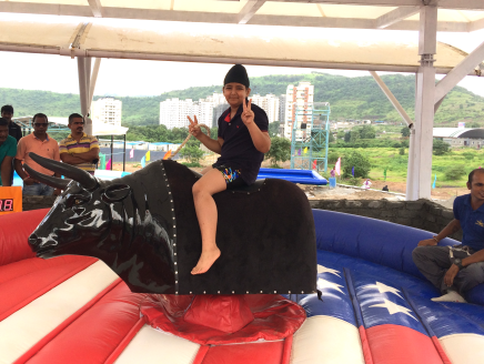 Bull ride - Experience bull ride at Sunny’s World adventure theme park near Pune.